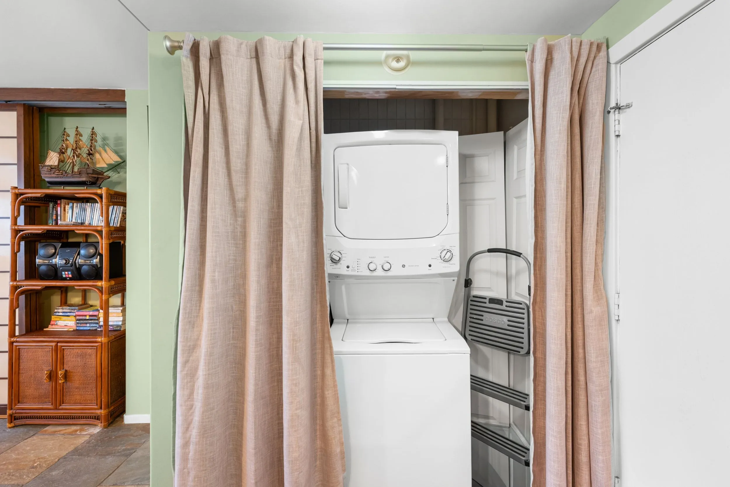 Stacked washer and dryer in a closet