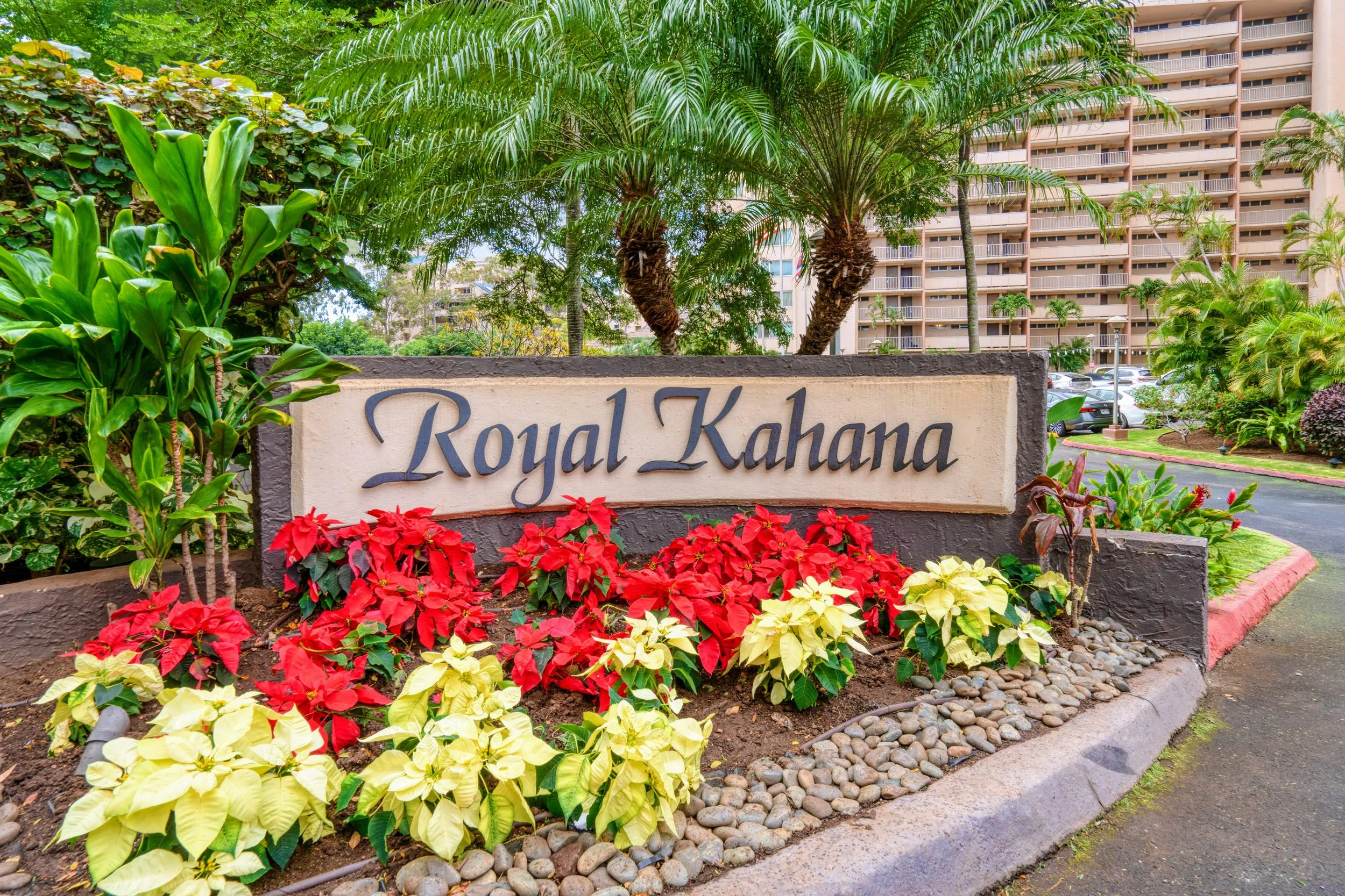 Royal Kahana entrance sign surrounded by flowers